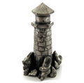 Candle snuffer made of pewter shaped as a light house with sea shells around the base cs2